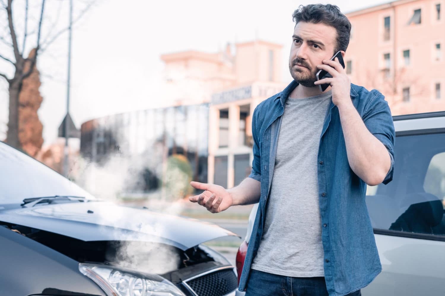 a man calling an attorney after a car accident in Montgomery, AL