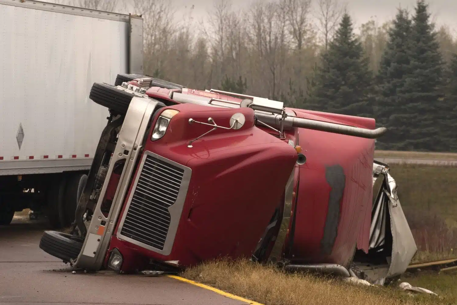 A truck laying in the road after an accident in Millbrook, AL.