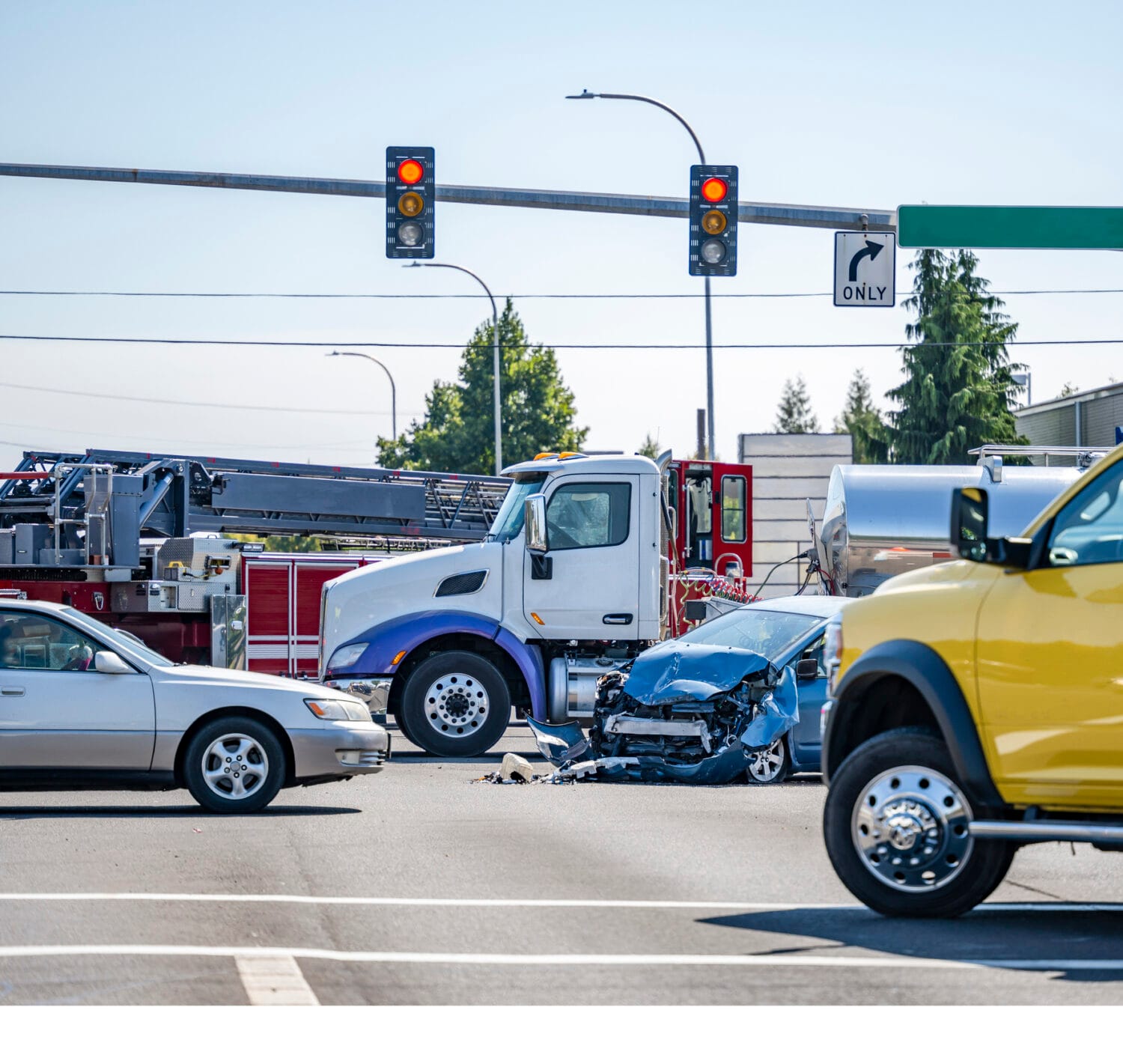 Cars and semi-truck involved in an accident at busy Tuskegee intersection